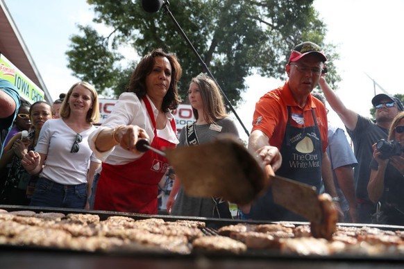 DES MOINES, IOWA - AUGUST 10: Democratic presidential candidate U.S. Sen. Kamala Harris (D-CA) cooks pork burgers at the Iowa Pork Producers tent while attending the Iowa State Fair on August 10, 2019 ...