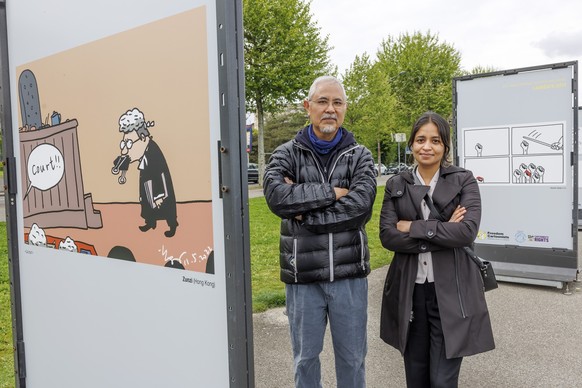 Laureates 2024 of the Kofi Annan Courage in Cartooning Award Zunzi of Hong Kong, left, and Rachita Taneja of India, pose during the presentation of the exhibition "Dessins pour la liberte" ( ...