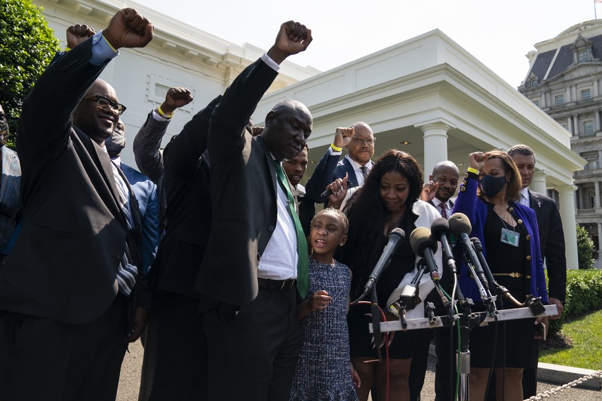 Gianna Floyd, the daughter of George Floyd, leads the chant &quot;say his name&quot; as members of the Floyd family talk with reporters after meeting with President Joe Biden at the White House, Tuesd ...