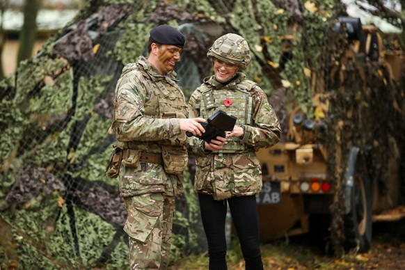 DEREHAM, ENGLAND - NOVEMBER 8: Catherine, Princess of Wales flies a drone as she visits The Queen's Dragoon Guards Regiment for the first time as their Colonel in Chief on November 8, 2023 in Der ...