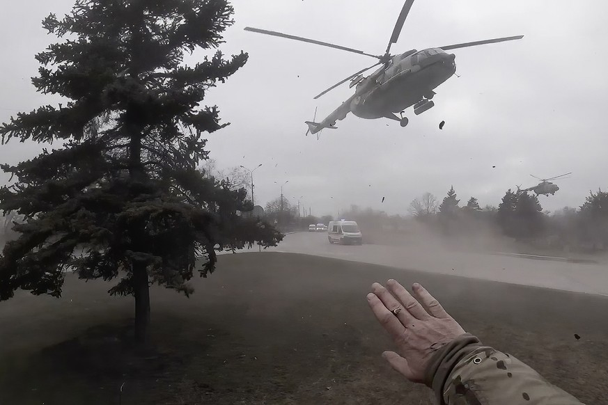 A Ukrainian medical evacuation helicopter lands in front of Yuliia Paievska, known as Taira, in Mariupol, Ukraine, on Feb. 27, 2022. Using a body camera, she recorded her team&#039;s frantic efforts t ...