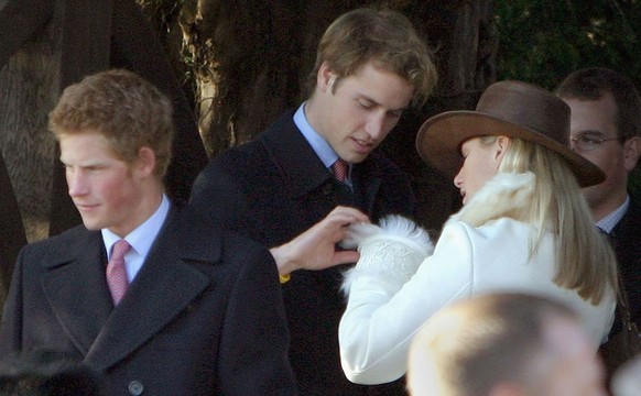 SANDRINGHAM, ENGLAND - DECEMBER 25: (L to R) Britain&#039;s Prince William, Prince Harry and Zara Phillips, daughter of Princes Anne, leave after attending the Christmas Day service at Sandringham Chu ...