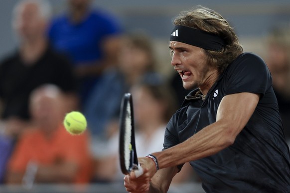 Germany&#039;s Alexander Zverev plays a shot against Bulgaria&#039;s Grigor Dimitrov during their fourth round match of the French Open tennis tournament at the Roland Garros stadium in Paris, Monday, ...