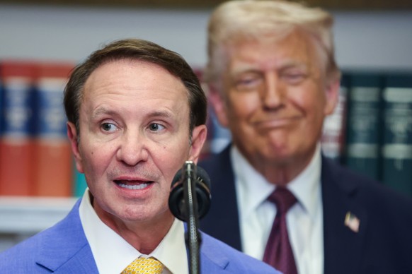 epa12608898 (FILE) - Louisiana Governor Jeff Landry speaks as US President Donald Trump listens in the Roosevelt Room at the White House in Washington, DC, USA, 24 March 2025 (reissued 22 December 202 ...