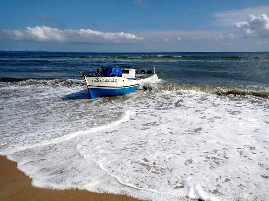 epa09653510 A handout photo made available by Madagascar's Ministry of Defence via Twitter shows the wreck of the boat 'Francia' after it was towed ashore, near off Mahambo, northeaster ...