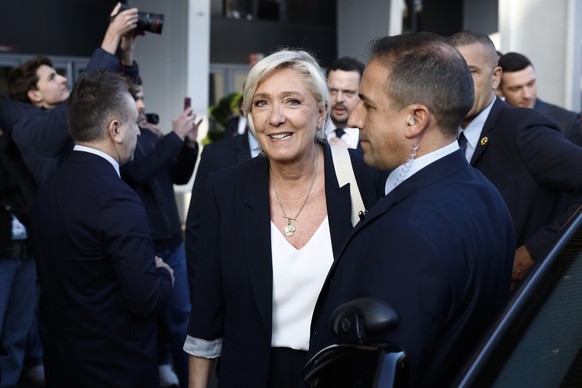 epa12777849 Rassemblement National (RN) parliamentary party leader Marine Le Pen (C) arrives at the Agriculture fair at Paris Expo Porte de Versailles in Paris, France, 26 February 2026. EPA/YOAN VALA ...