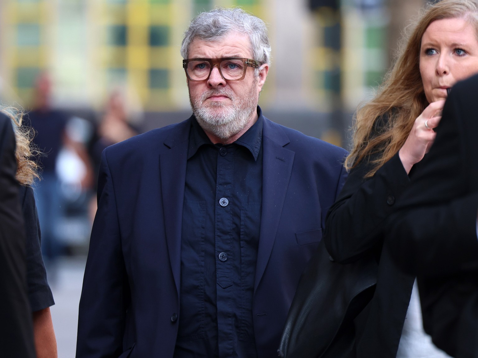epa12325746 Paul Gallagher, older brother of Oasis stars Noel and Liam, arrives at court in London, Britain, 27 August 2025. Gallagher, 59, is charged with rape, coercive and controlling behavior, thr ...