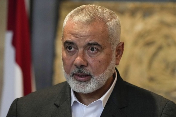 FILE - Ismail Haniyeh, the leader of the Palestinian militant group Hamas, speaks to journalists after his meeting with Lebanese Parliament Speaker Nabih Berri, in Beirut, Lebanon, on June 28, 2021. T ...