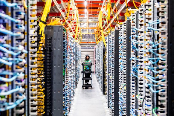 IMAGE DISTRIBUTED FOR AWS - A technician works at an Amazon Web Services AI data center in New Carlisle, Ind., on Thursday, Oct. 2, 2025. (Noah Berger/Amazon Web Services via AP Images)
AWS Data Cente ...