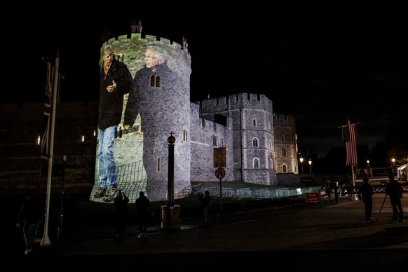 An image of Britain&#039;s Prince Andrew alongside disgraced financier Jeffrey Epstein is projected by by the campaign group Led By Donkeys on Windsor castle, after the arrival of U.S. President Donal ...