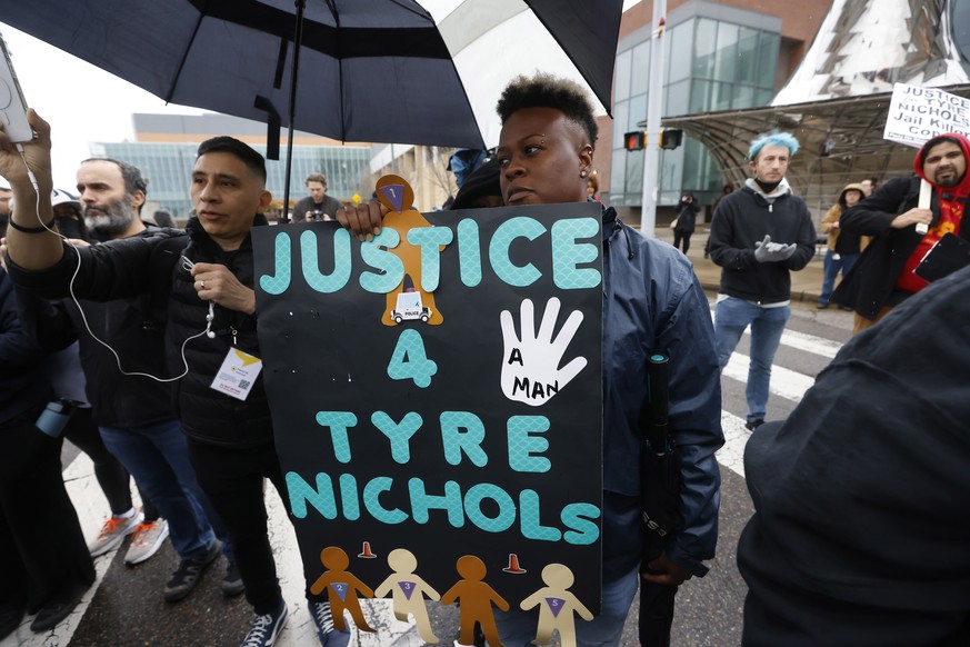 epa10436981 Protesters march downtown a day after the release of video footage showing the encounter earlier this month between Tyre Nichols, 29, and five Memphis police officers which resulted in Nic ...