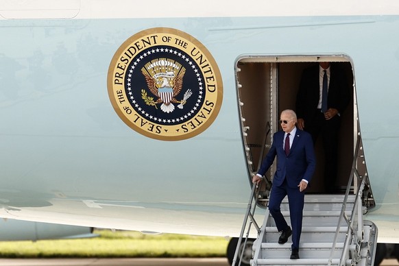 epa11390675 US President Joe Biden disembarks from the 'Air Force One' as he arrives at Paris Orly airport, near Paris, France, 05 June 2024. US President Biden arrived in France to attend t ...