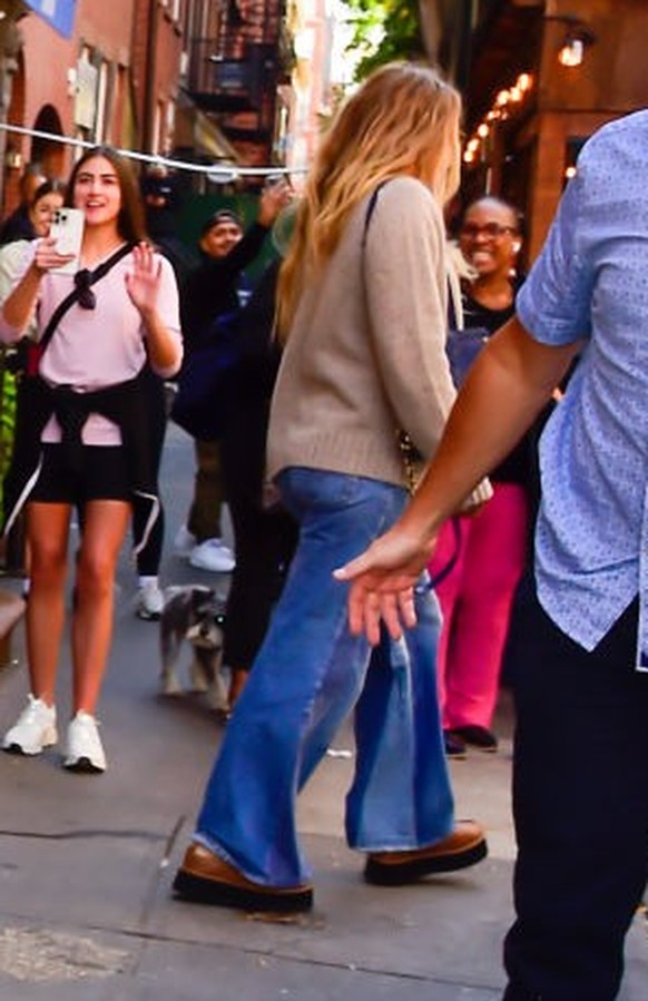 NEW YORK, NEW YORK - OCTOBER 26: Taylor Swift (L) and Blake Lively are seen on October 26, 2023 in New York City. (Photo by Raymond Hall/GC Images)