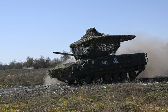 Russia Ukraine Military Operation BMP Crews Training 8776093 24.09.2024 Russian servicemen drive a BMP-3 infantry fighting vehicle during a combat training amid Russia s military operation in Ukraine, ...