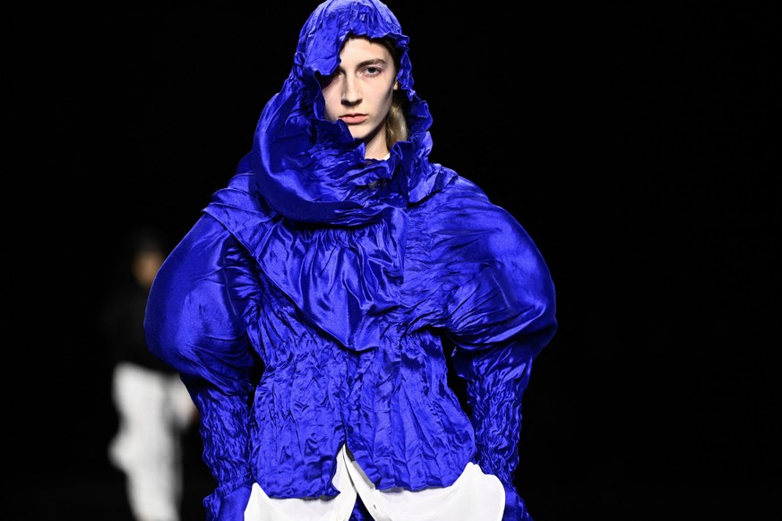 A models presents a creation for Issey Miyake Women's Spring/Summer 2027 collection fashion show as part of the Paris Fashion Week, in Paris on October 2, 2026. (Photo by JULIEN DE ROSA / AFP)