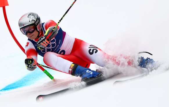 epa12737221 Marco Odermatt of Switzerland competes in the Men's Giant Slalom of the Alpine Skiing competitions at the Milano Cortina 2026 Winter Olympic Games, Stelvio ski centre in Bormio, Italy ...