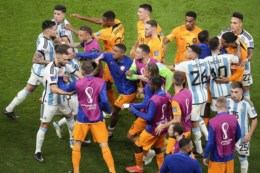 Netherlands and Argentina players argue during the World Cup quarterfinal soccer match between the Netherlands and Argentina, at the Lusail Stadium in Lusail, Qatar, Friday, Dec. 9, 2022. (AP Photo/Ar ...