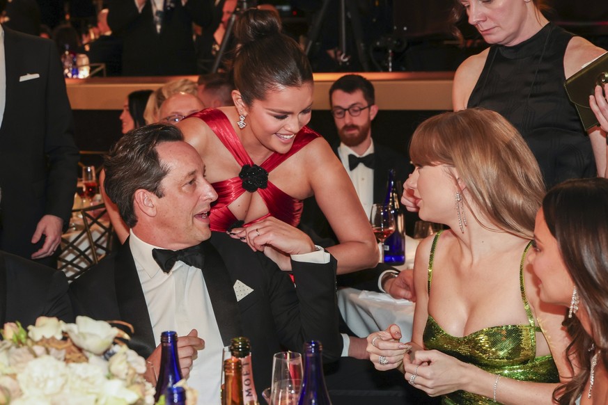 David Greenbaum, Selena Gomez and Taylor Swift at the 81st Golden Globe Awards held at the Beverly Hilton Hotel on January 7, 2024 in Beverly Hills, California. (Photo by Christopher Polk/Golden Globe ...