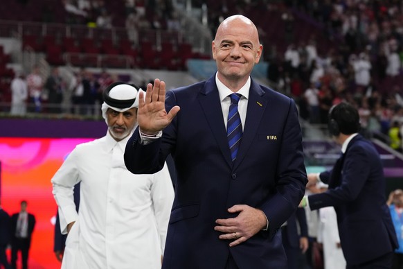 FIFA President Gianni Infantino attends at the medals ceremony after the World Cup third-place playoff soccer match between Croatia and Morocco at Khalifa International Stadium in Doha, Qatar, Saturda ...