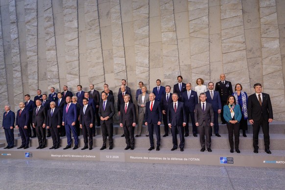 epa12730683 NATO Secretary General Mark Rutte (C-L) and the US Under Secretary of Defense Elbridge A. Colby (C-R) pose with Defence Ministers from NATO countries during the meeting of the NATO Ministe ...