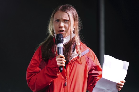 Climate activist Greta Thunberg speaks on the stage after a protest during the Cop26 summit in Glasgow, Scotland, Friday, Nov. 5, 2021. The protest was taking place as leaders and activists from aroun ...