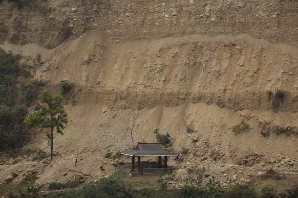 epa11261912 A pavilion is struck by a landslide at the Taroko National Park, following the April 03 earthquake that hit the island, in Hualien, Taiwan, 05 April 2024 (issued 06 April 2026. More than a ...
