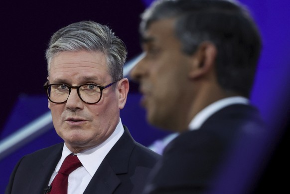 Britain&#039;s Prime Minister Rishi Sunak and opposition Labour Party leader Keir Starmer, left, take part for the BBC&#039;s Prime Ministerial Debate, in Nottingham, England, Wednesday June 26, 2024. ...