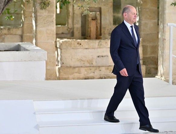 FASANO, ITALY - JUNE 13: German Chancellor Olaf Scholz is greeted by Italian Prime Minister Giorgia Meloni during a welcome ceremony on day one of the 50th G7 summit at Borgo Egnazia on June 13, 2024 ...