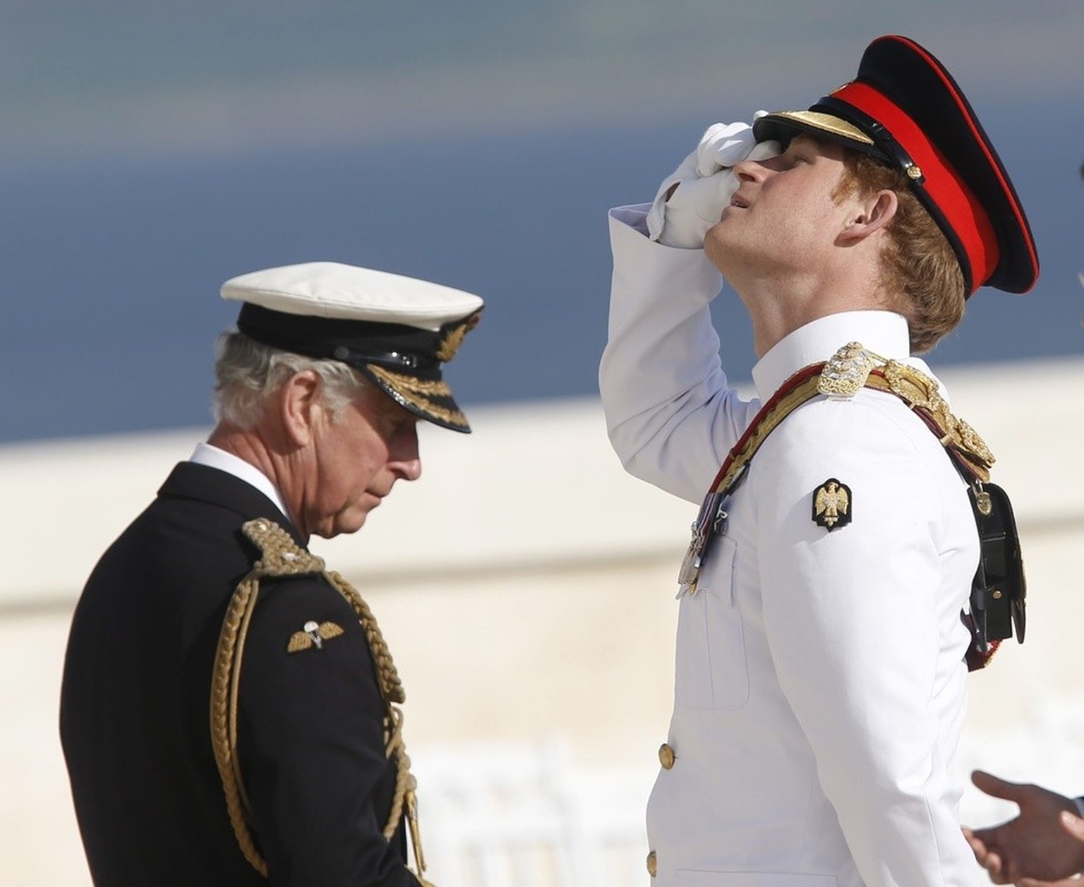 epa04719157 Britain&#039;s Prince Charles (L) and Prince Harry (R) visit the Cape Helles English Memorial during a commemorative event of the Battle of Gallipoli, in Gallipoli, Turkey, 24 April 2015.  ...