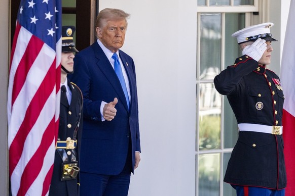 epa11921985 US President Donald J. Trump waits for French President Emmanuel Macron to arrive at the White House in Washington, DC, USA, 24 February 2025. EPA/SHAWN THEW