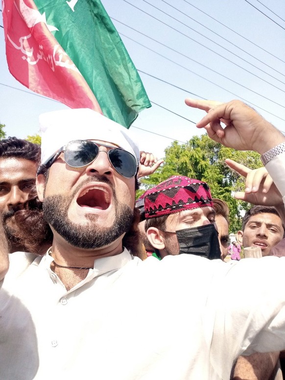 epa10618879 Supporters of Pakistan&#039;s former Prime Minister Imran Khan gather as they protest against Khan&#039;s arrest, in Faisalabad, Pakistan, 10 May 2023. At least four people died and dozens ...