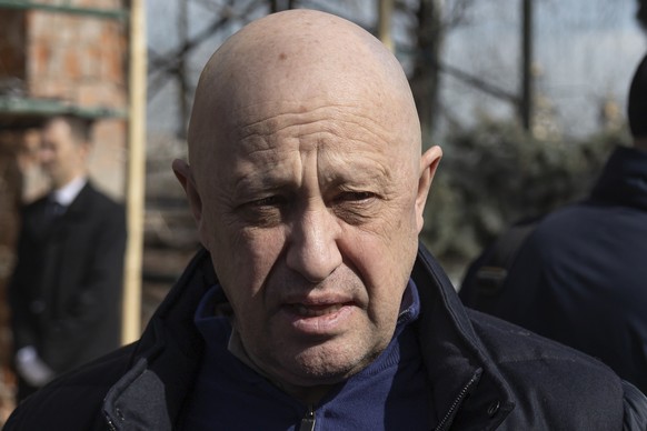 Yevgeny Prigozhin, the owner of the Wagner Group military company, arrives to pay the last respects to slain Russian military blogger Vladlen Tatarsky, during a funeral ceremony at the Troyekurovskoye ...