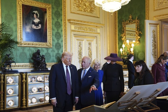 President Donald Trump, first lady Melania Trump, Britain&#039;s King Charles III and Britain&#039;s Queen Camilla view a special display of items from the Royal Collection relating to the United Stat ...