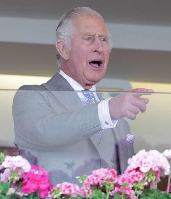 ASCOT, UNITED KINGDOM - JUNE 24: (EMBARGOED FOR PUBLICATION IN UK NEWSPAPERS UNTIL 24 HOURS AFTER CREATE DATE AND TIME) Queen Camilla, King Charles III and Lady Gabriella Windsor watch, from the Royal ...