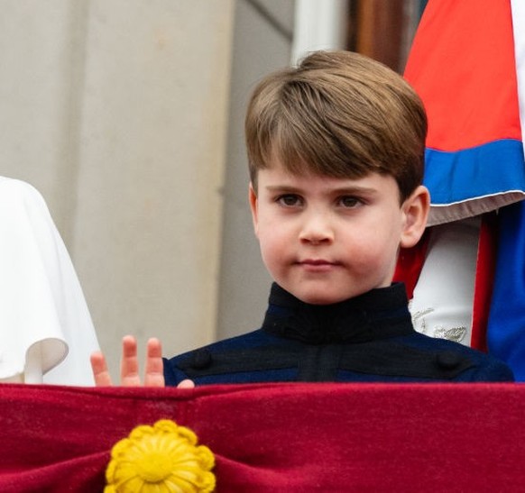 LONDON, ENGLAND - MAY 06: Princess Charlotte of Wales and Prince Louis of Wales on the balcony of Buckingham Palace following the Coronation of King Charles III and Queen Camilla on May 06, 2023 in Lo ...