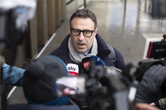 epa12726474 Fabrizio Ventimiglia lawyer for several victims speaks to journalists to a hearing before the public prosecutor of the canton of Valais, following the deadly fire at the 'Le Constella ...