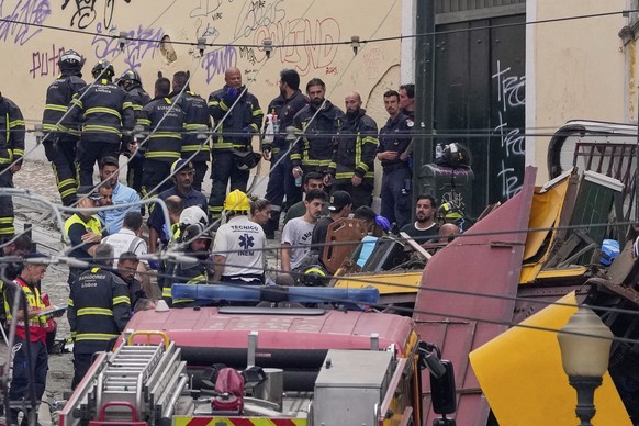 Emergency teams work at the site of a derailed electric streetcar in Lisbon, Portugal, Wednesday, Sept. 3, 2025. (AP Photo/Armando Franca)
Portugal-Streetcar Derailed