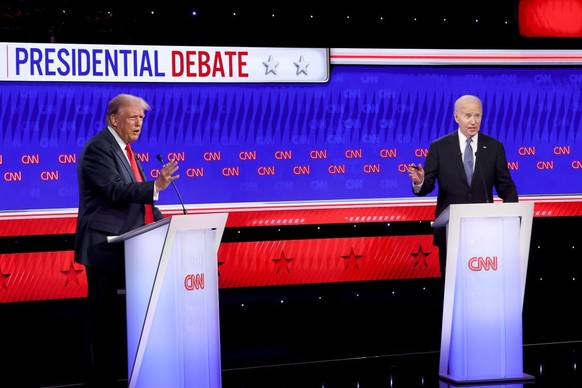ATLANTA, GEORGIA - JUNE 27: U.S. President Joe Biden (R) and Republican presidential candidate, former U.S. President Donald Trump participate in the CNN Presidential Debate at the CNN Studios on June ...