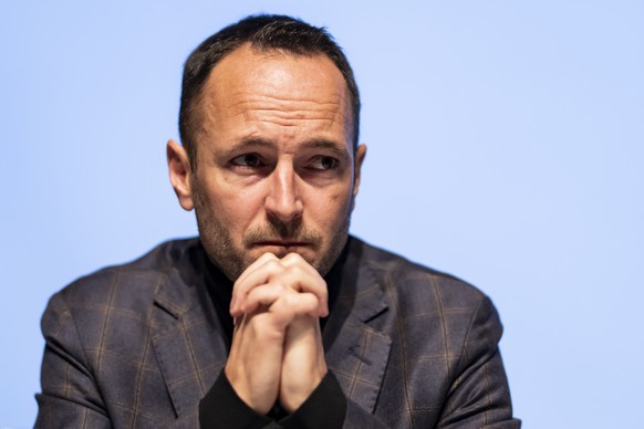 epa12620940 Mathias Reynard, state councillor and president of the Council of State of the Canton of Valais, reacts during a press conference about the Le Constellation bar and lounge fire in Crans-Mo ...
