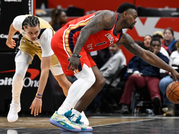 Kyshawn George (à gauche) et les Wizards ont subi la loi de Zion Williamson et des Pelicans vendredi