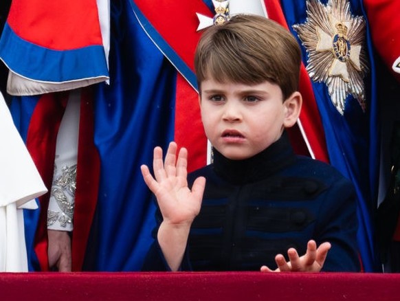 LONDON, ENGLAND - MAY 06: Princess Charlotte and Prince Louis on the balcony of Buckingham Palace, London, following the coronation on May 06, 2023 in London, England. The Coronation of Charles III an ...