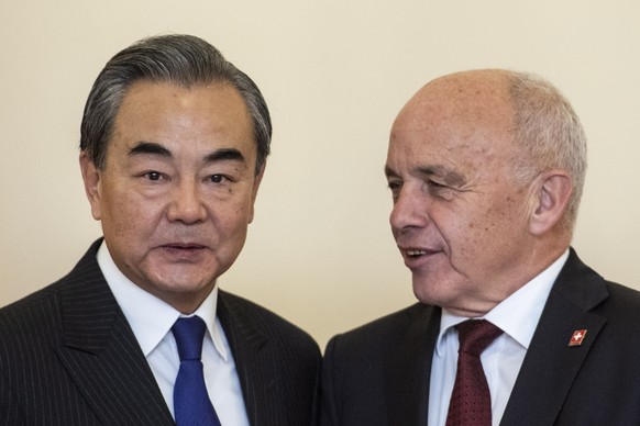 epa07939744 Swiss President Ueli Maurer (R) welcomes Chinese Foreign Minister Wang Yi in Bern, Switzerland, 22 October 2019. Chinese Foreign Minister Wang Yi is in Switzerland on an official working v ...