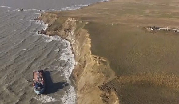 epa11781142 A still image taken from a handout video released by the press service of the Ministry of Natural Resources of the Russian Federation shows a damaged tanker in the Kerch Strait, Russia 16  ...