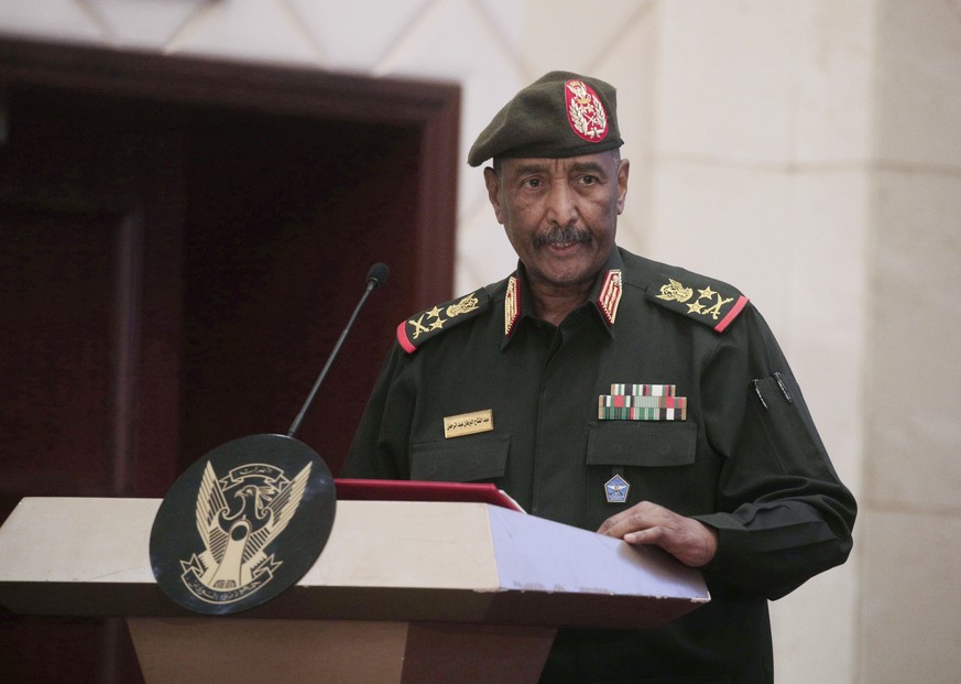 FILE - Sudan&#039;s Army chief Gen. Abdel-Fattah Burhan speaks following the signature of an initial deal aimed at ending a deep crisis caused by last year&#039;s military coup, in Khartoum, Sudan, De ...