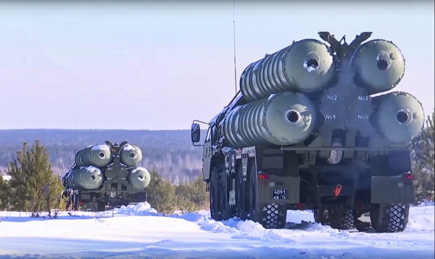 epa09714557 A handout still image taken from handout video made available by the Russian Defence Ministry press service shows Russian S-400 mobile long-range surface-to-air missile (LR-SAM) systems de ...