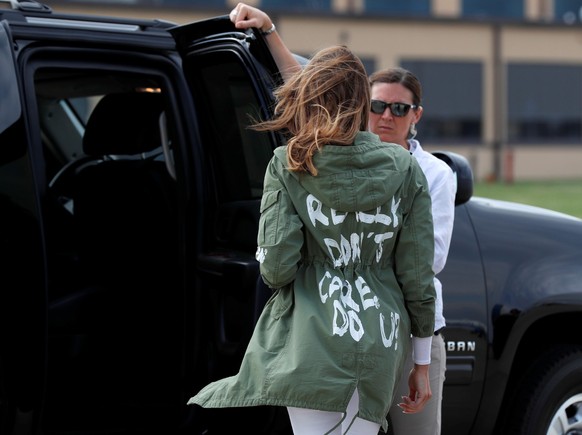 U.S. first lady Melania Trump walks from her plane to her motorcade wearing a Zara design jacket with the phrase &quot;I Really Don&#039;t Care. Do U?&quot; on the back as she returns to Washington fr ...