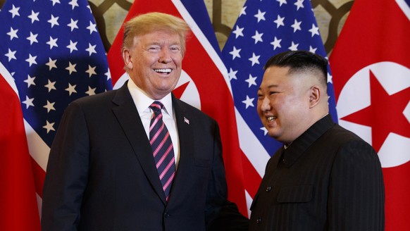 FILE - In this Feb. 27, 2019 file photo, President Donald Trump, left, meets North Korean leader Kim Jong Un, in Hanoi. President Trump met North Korean leader Kim on the heavily fortified border betw ...