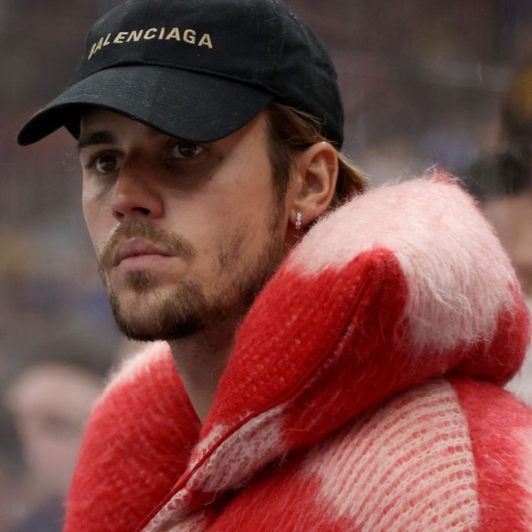 TORONTO, ONTARIO - FEBRUARY 03: Justin Bieber looks on from the bench area of Team Matthews during their game against Team Hughes at the 2024 Honda NHL All-Star Game at Scotiabank Arena on February 03 ...
