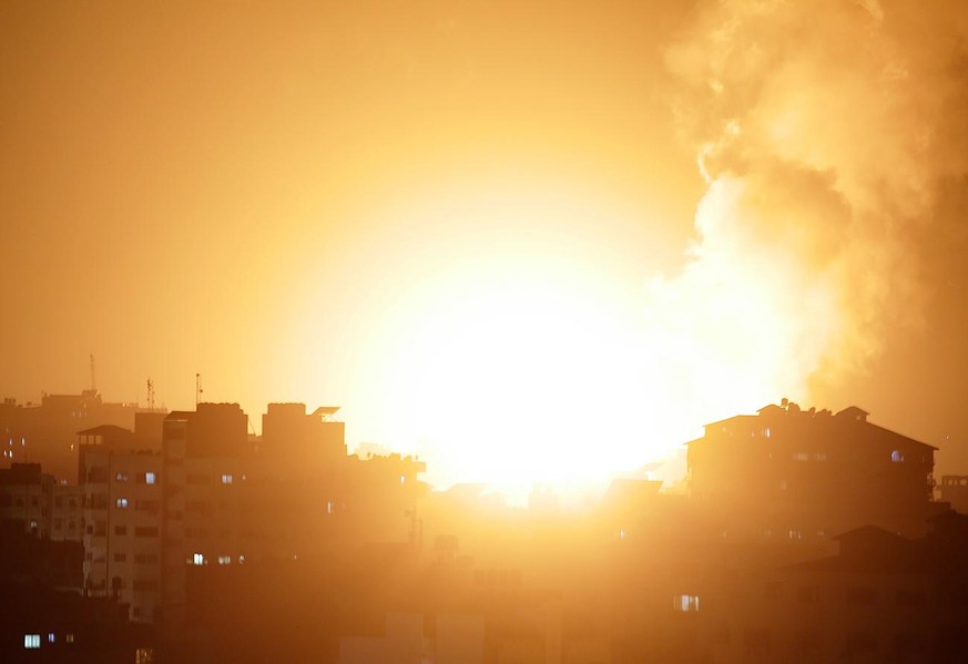 Rockets are launched from the Gaza Strip towards Israel, Monday, May. 10, 2021. Hamas militants fired dozens of rockets into Israel on Monday, including a barrage that set off air raid sirens as far a ...