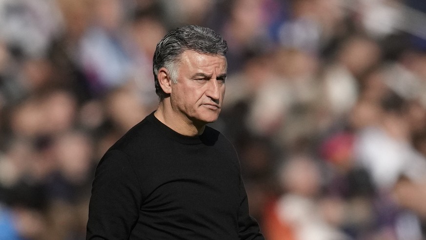 PSG&#039;s head coach Christophe Galtier stands during the French League One soccer match between Paris Saint-Germain and Lille at the Parc des Princes stadium, in Paris, France, Sunday, Feb. 19, 2023 ...